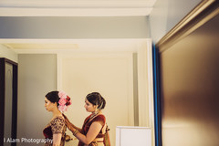 Indian bride being assited by special guest. Indian bride being assited by special guest.