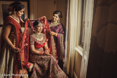 Gorgeous Indian bride getting ready for the celebration. Gorgeous Indian bride getting ready for the celebration.