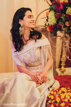 Beautiful Indian wedding guest during the rituals. Beautiful Indian wedding guest during the rituals.