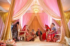 Indian bride and groom during the nuptials. Indian bride and groom during the nuptials.