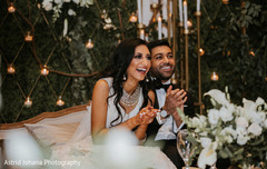 Bride and groom reacting to speeches. Bride and groom reacting to speeches.