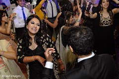 Upbeat indian bride and groom dancing Upbeat indian bride and groom dancing