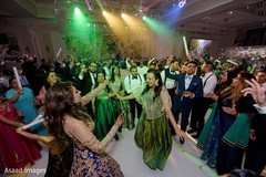 Adorable Indian bride dancing with a friend Adorable Indian bride dancing with a friend