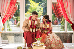 Joyful Indian couple in their wedding ceremony. Joyful Indian couple in their wedding ceremony.