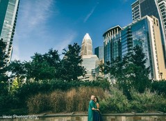 Heartwarming Indian bride and groom outdoors capture. Heartwarming Indian bride and groom outdoors capture.
