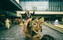 Indian groom riding baraat white horse. Indian groom riding baraat white horse.