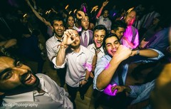 Indian wedding guests rocking the dance floor. Indian wedding guests rocking the dance floor.