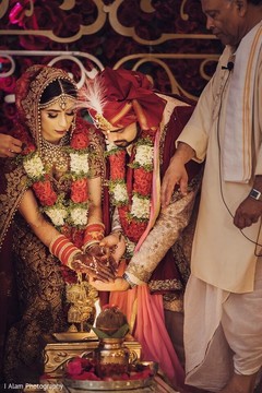 Indian bride and groom during the nuptials. Indian bride and groom during the nuptials.