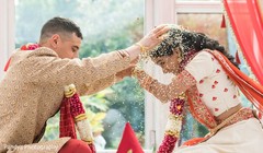 Indian groom tossing rise on his Maharani. Indian groom tossing rise on his Maharani.
