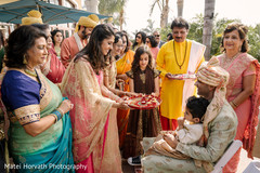 Indian groom being greeted by his Maharani's family. Indian groom being greeted by his Maharani's family.