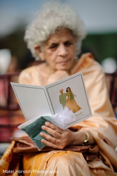 Maharani's relative reading the program. Maharani's relative reading the program.