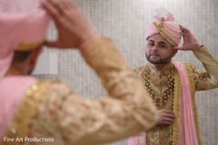 Raja fixing his pagri. Raja fixing his pagri.