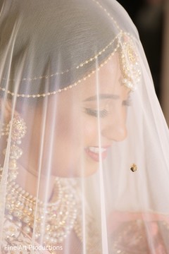 Maharani behind her ceremony veil. Maharani behind her ceremony veil.
