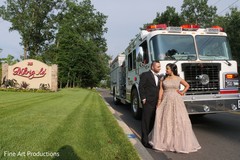 Newlyweds posing by the fire truck prior to the reception. Newlyweds posing by the fire truck prior to the reception.