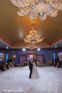 A stunning moment between the Indian newlyweds at the reception. A stunning moment between the Indian newlyweds at the reception.