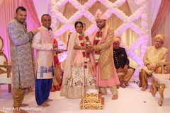 Special guests with the Indian newlyweds during the rituals. Special guests with the Indian newlyweds during the rituals.