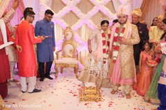 Raja and Maharani holding hands after the ceremony. Raja and Maharani holding hands after the ceremony.