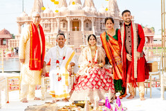 Indian bride posing with family Indian bride posing with family