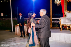 Indian bride dancing with her father capture Indian bride dancing with her father capture