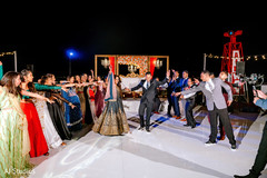 Indian bride and groom dancing at their reception party Indian bride and groom dancing at their reception party