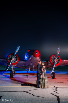 Indian couple photo session in front of a light aircraft Indian couple photo session in front of a light aircraft
