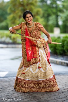 Indian Maharani posing for pictures holding the kirpan. Indian Maharani posing for pictures holding the kirpan.