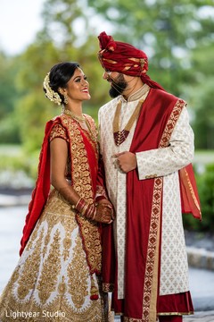Portrait of the Indian couple posing for the photoshoot. Portrait of the Indian couple posing for the photoshoot.