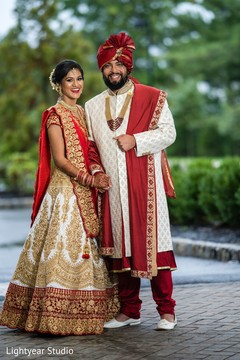 Indian couple wearing the traditional Indian ceremonial attires. Indian couple wearing the traditional Indian ceremonial attires.