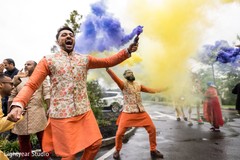 Groomsmen holding color smoke during baraat. Groomsmen holding color smoke during baraat.