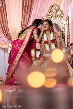 Maharani wearing the flower garland during the ceremony. Maharani wearing the flower garland during the ceremony.