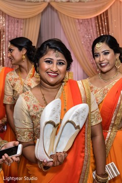 Bridesmaids wearing the orange sherbet traditional saree. Bridesmaids wearing the orange sherbet traditional saree.