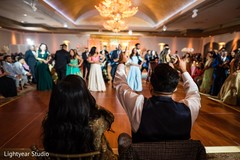Newlyweds reacting to the choreographies. Newlyweds reacting to the choreographies.