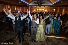 Indian newlyweds celebrating with their loved ones. Indian newlyweds celebrating with their loved ones.