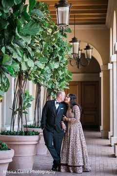 Indian bride and groom posing at wedding venue. Indian bride and groom posing at wedding venue.
