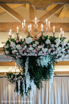 Indian wedding chandelier flowers decoration. Indian wedding chandelier flowers decoration.