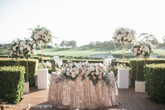 White and pink Indian couple's reception table. White and pink Indian couple's reception table.