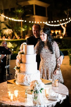 indian couple cutting cake moment. indian couple cutting cake moment.