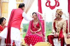Indian bride at her wedding ceremony bottu ritual. Indian bride at her wedding ceremony bottu ritual.