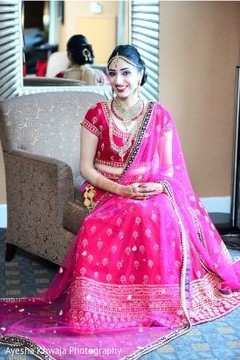 Indian bride posing with ceremony lehenga. Indian bride posing with ceremony lehenga.