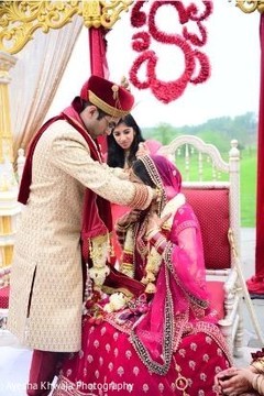 Indian couple during the Mangalsutra ritual. Indian couple during the Mangalsutra ritual.