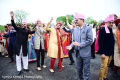 Indian wedding guests dancing at baraat procession. Indian wedding guests dancing at baraat procession.