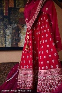 Red and golden maharanis wedding ceremony lehenga. Red and golden maharanis wedding ceremony lehenga.