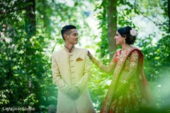 Indian groom and Indian bride during photo session. Indian groom and Indian bride during photo session.