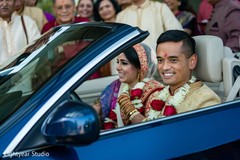 Recently married Indian couple in a car. Recently married Indian couple in a car.