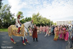 Indian groom on his white horse at his baraat procession. Indian groom on his white horse at his baraat procession.