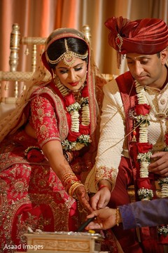 Indian couple during the sacred fire ritual. Indian couple during the sacred fire ritual.