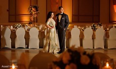 Indian couple posing at reception venue. Indian couple posing at reception venue.
