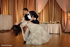 Indian couple having an up beat dance at reception party. Indian couple having an up beat dance at reception party.