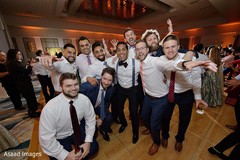 Indian groomsmen on their wedding reception outfits. Indian groomsmen on their wedding reception outfits.