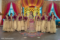 Maharani posing with indian bridesmaids at Sangeet stage. Maharani posing with indian bridesmaids at Sangeet stage.